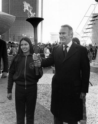 Governor Carey receives the Olympic Torch