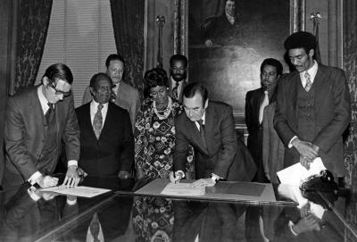 Governor Carey signs Martin Luther King Day Proclamation