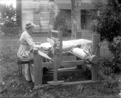 Woman at loom.  Weaving Tablecloth. Belfast, Northern Ireland