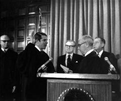 Governor Rockefeller watching as judges are sworn in