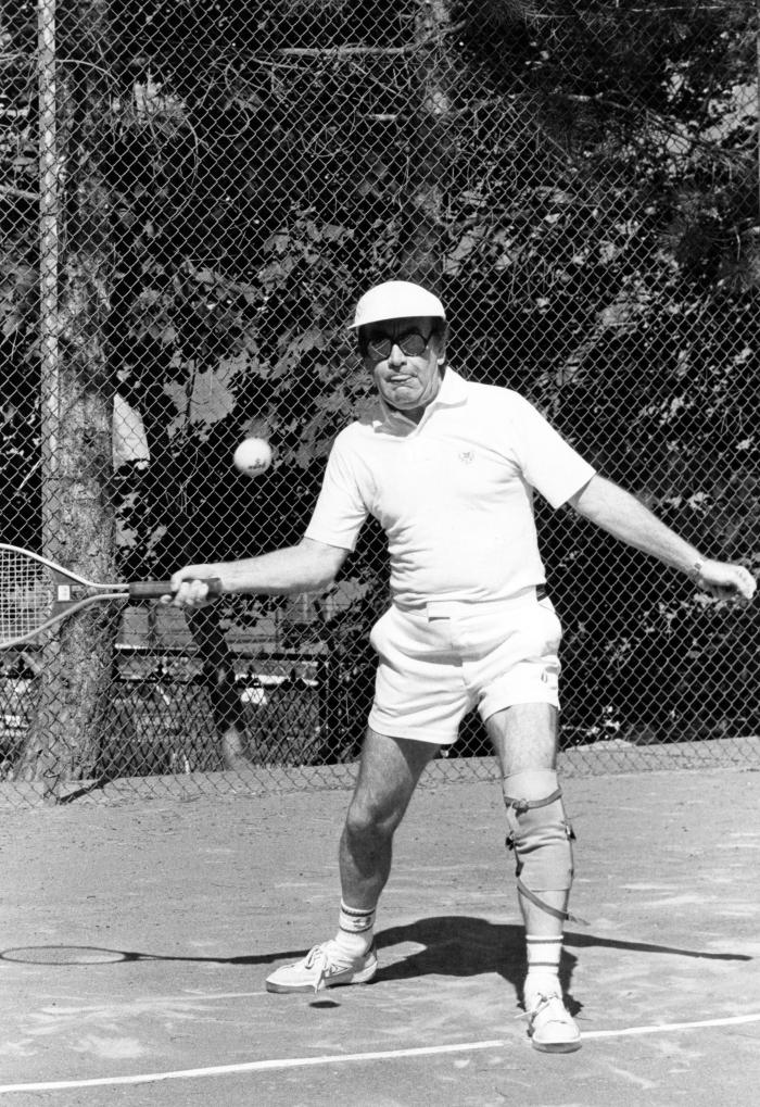 Governor Carey playing tennis