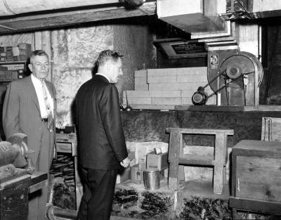 Governor Rockefeller inspects fallout shelter in capitol.