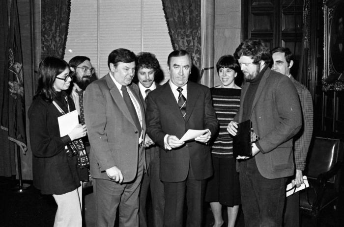 Governor Carey being presented with an invitation to the LCA show