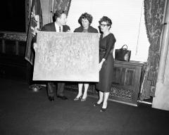 Governor Rockefeller receiving a painting