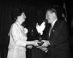 Governor Rockefeller receiving award from Lady Bird Johnson