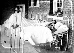 Child in Hospital Bed