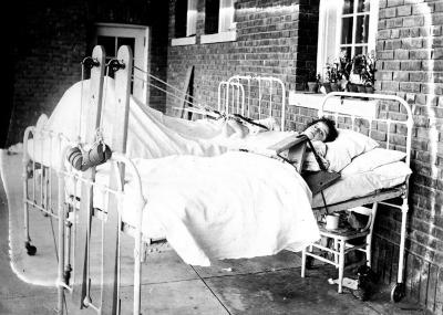 Child in Hospital Bed