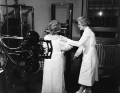 Patient undergoing X-ray, 1950