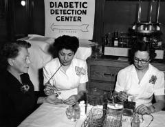 Two nurses testing for diabetes, 1954