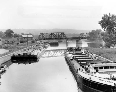 Canal. Canal at Waterford, NY, with boats and bridge in background