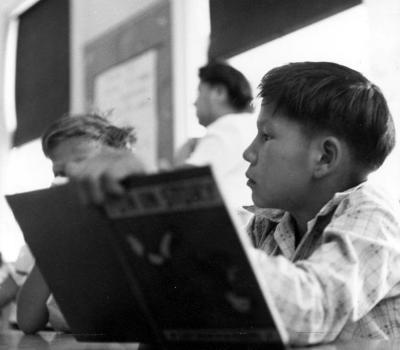 Thomas Indian School Photograph,  Young Boy with Textbook