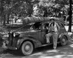 Thomas Indian School Photograph.  Traveler with Car and Canoe