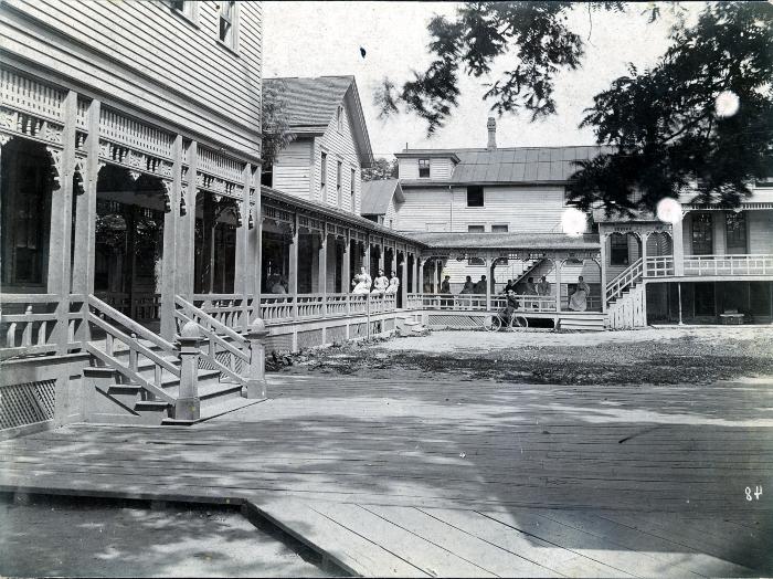 Thomas Indian School Photograph. Exterior View of Girls' Dormitory with Multiple Porches