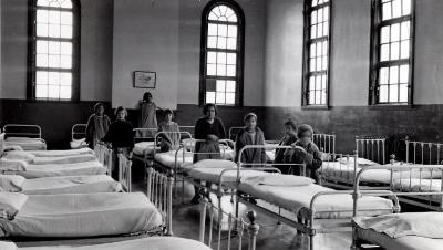 Thomas Indian School Photograph.  Young Girls in Dormitory Room