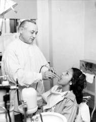 Thomas Indian School Photograph. Oral Hygiene: Girl Examined by Dentist