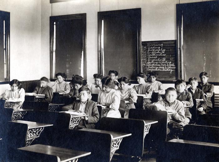 Thomas Indian School Photograph.  Boys and Girls in Classroom