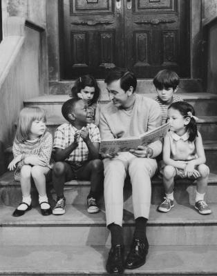 Bob reading to a group of children on Sesame Street