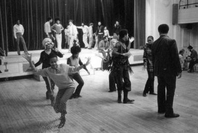 Members of the Afro-American Total Theatre dancing in rehearsal