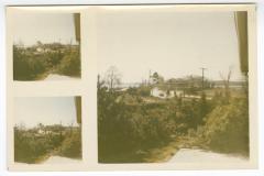 View of yard, car, house