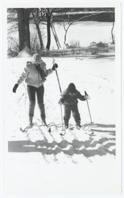 Woman and child skiing. Caleb Smith State Park Cross Country Ski Clinic