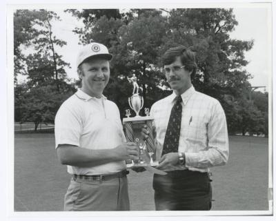 Image of man presenting check to another man. Sunken Meadow State Park Bank of New York Golf