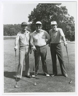 Three men on golf course. Long Island PGA Tournament. Bethpage State Park