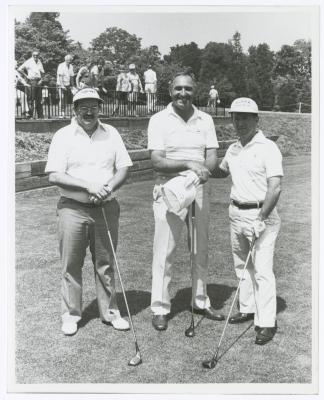 Three men on golf course. Long Island PGA Tournament. Bethpage State Park