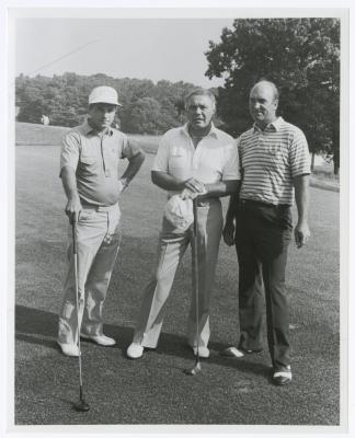 Three men on golf course. Long Island PGA Tournament. Bethpage State Park
