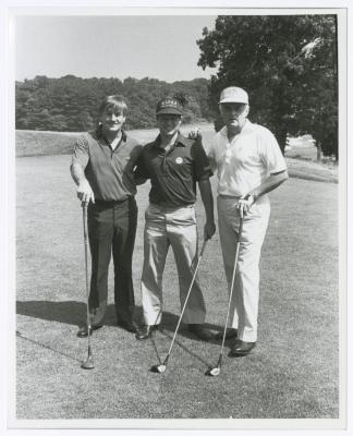 Three men on golf course. Long Island PGA Tournament. Bethpage State Park