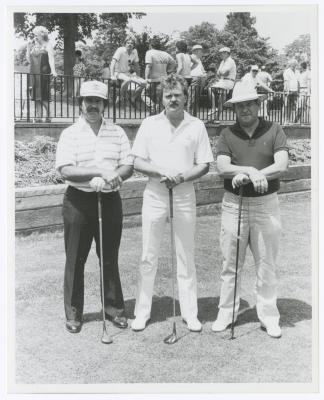 Three men on golf course. Long Island PGA Tournament. Bethpage State Park