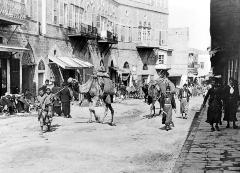 Syria.  Jaffa.  Street Scene; Natives and Camels