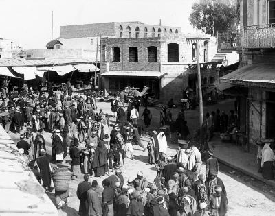 Syria. Jaffa. Arab Bazaar, or Market Square; Stalls, Crowds of People in Varied Costumes