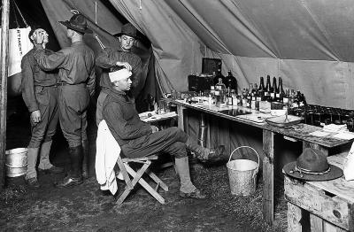 Within a Hospital Tent; Putting on Bandages, Examining Eye. Allentown, Penn.