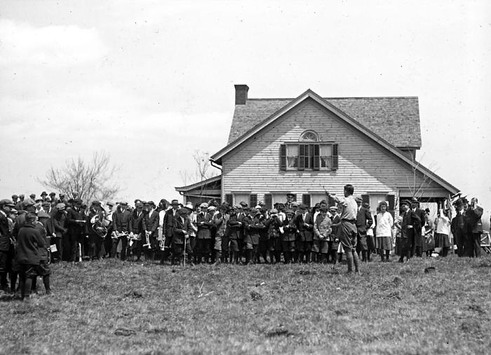 School Planting. R.T. Gheen Instructing pupils how to plant young trees. Newburgh, NY, May 4, 1916.