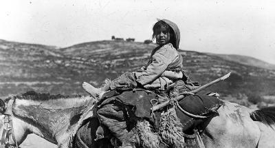 Refugee Child on Mule Returning to His House in Nablus. Palestine