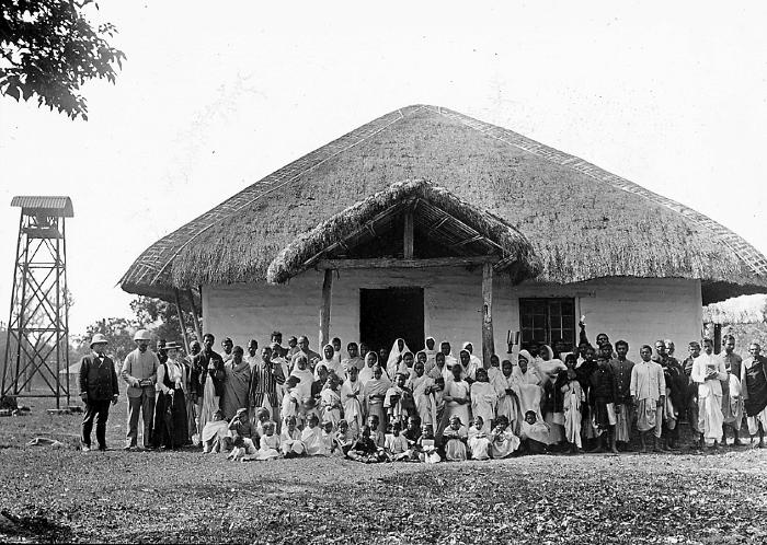 Group of natives and missionaries. Eastern Bengal and Assam, India