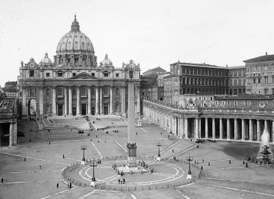 Italy.  Rome.  Piazza di San Pietro: St Peter's Church, the Vatican (right), Obelisk.