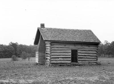 Civil War. Kelly House, side view of log cabin