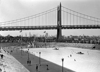 New York City. Municipal Swimming Pool With Triborough Bridge In Background.