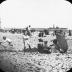 Children playing in sand at Coney Island