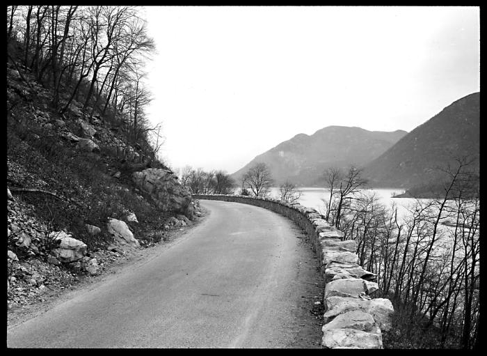 New York. Hudson River. State highway along southeast face of Storm King; River, Mount Taurus and Breakneck