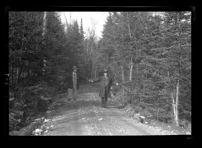 Truck Trail in Adirondacks.  Men Showing Width of Road