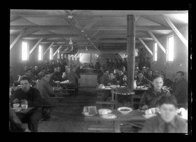 Civilian Conservation Corps members eating in a mess hall near Barnum Pond, Franklin County