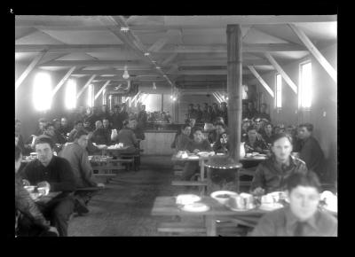 Civilian Conservation Corps eating in a mess hall at CCC camp near Barnum Pond, Franklin County