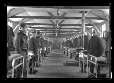 Civilian Conservation Corps members standing in a barracks at camp near Barnum Pond, Franklin County