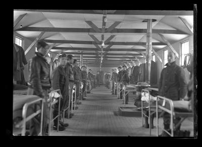 Civilian Conservation Corps members standing at attention near Barnum Pond, Franklin County