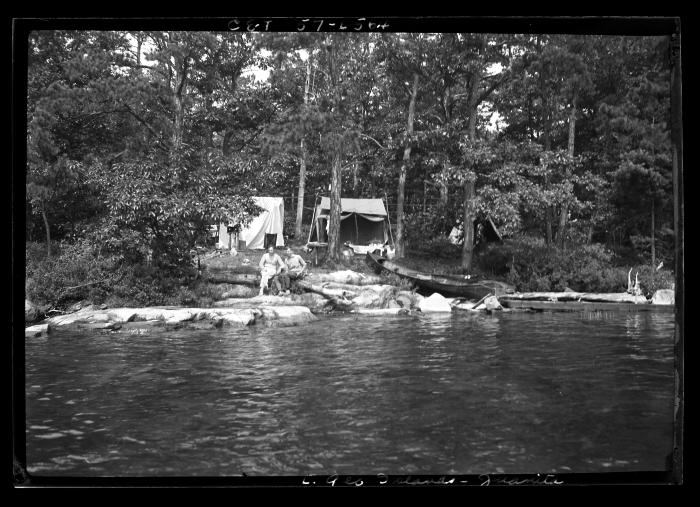 Camp on Juanita Island, Lake George Showing Tent Platforms and Campers