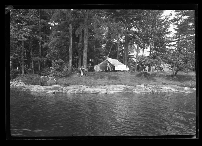 Camp on Juanita Island, Lake George Showing Tent Platforms and Campers