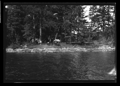 Camp on Juanita Island, Lake George Showing Tent Platforms and Campers