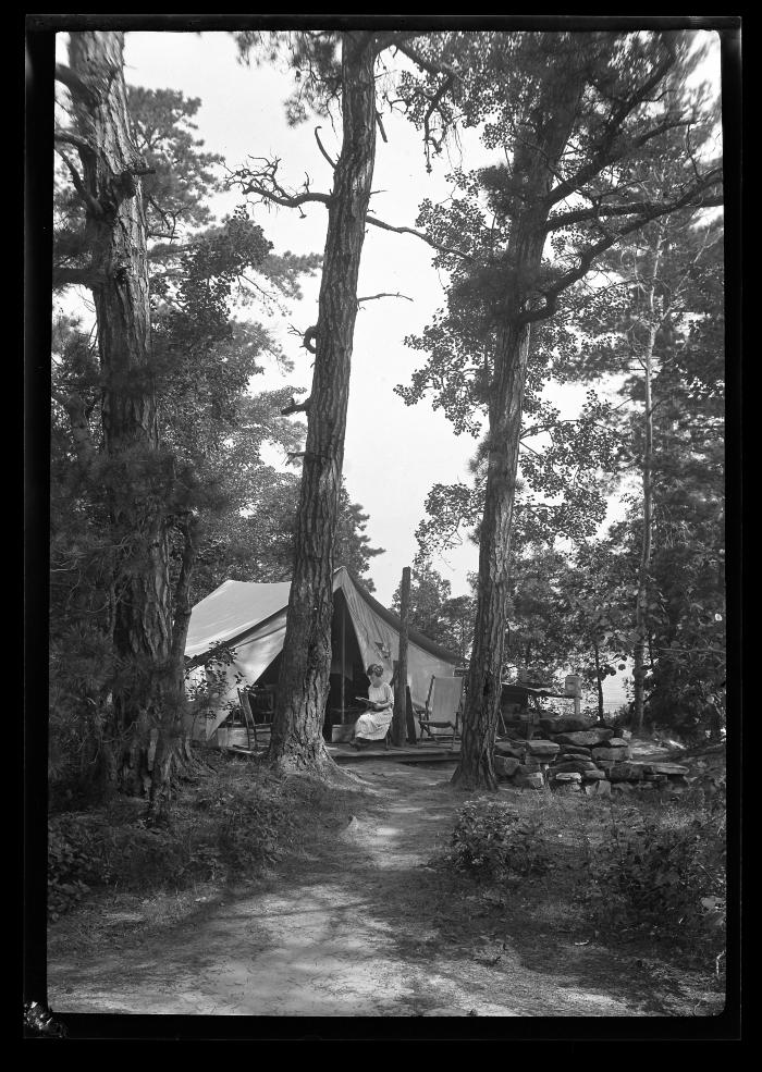 Camp on Juanita Island, Lake George Showing Tent Platforms and Campers